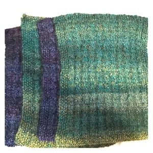 Four artist created knitted placemats